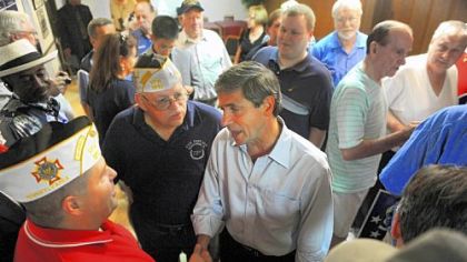 Democratic U.S. Senate candidate Joe Sestak, center, greets members of the crowd after speaking with a group of veterans at the Brentwood VFW on Clairton Boulevard on Monday.