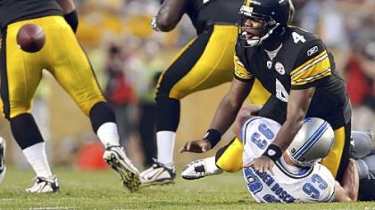 Byron Leftwich is taken down by Detroit's Kyle Vanden Bosch in the first quarter of the Steelers' 23-7 preseason victory Saturday night.