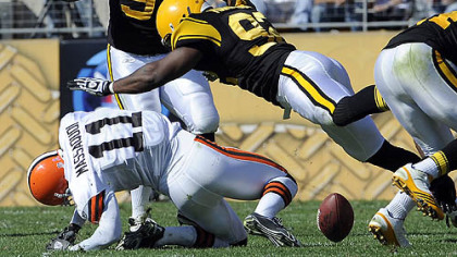 Steelers linebacker James Harrison puts a hard hit on Browns wide receiver Mohamed Massaquoi in the second quarter of Sunday's game at Heinz Field. Harrison was fined $75,000 for the hit.