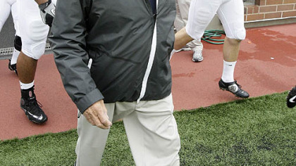 Penn State head coach Joe Paterno leads his team out on to the field before a a game against Minnesota last month in Minneapolis. Penn State won 33-21.