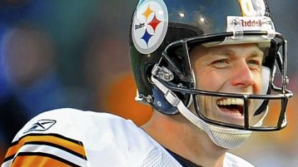 Kicker Shaun Suisham celebrates his 41-yard winning field goal in overtime against the Bills Sunday.