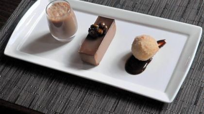 The sweets at Spoon include chocolate milk, chocolate mousse and a chocolate truffle beignet.