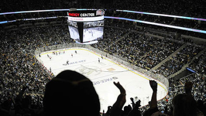 Fans cheer in the third period of Thursday's game at Consol Energy Center.