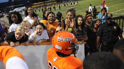 Clairton fans cheer on the football team as players enter the stadium during a home game Sept. 24 against Chartiers-Houston.