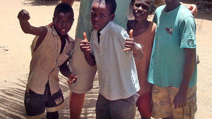 The Penguins' Mike Rupp hanging out with some of the children at the orphanage.