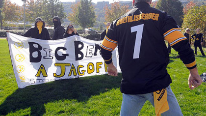 A Steelers fan taunts those protesting outside Heinz Field Ben Roethlisberger's return to the Steelers' lineup on Sunday.