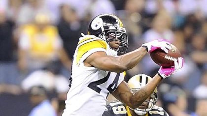 Ike Taylor intercepts a pass in the first half against the Saints Sunday at the Louisiana Superdome in New Orleans.