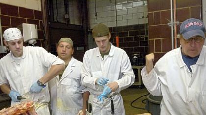 Participating in the grass-fed beef butchery master class at Jamison Farm's processing plant near Latrobe are, from left, Bill Marshall, Jon Hollick, Tom Marshall and John Jamison.