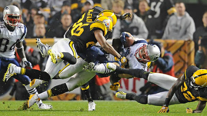Steelers safety Ryan Clark tackles Patriots running back Danny Woodhead in the second quarter of last Sunday's game at Heinz Field.